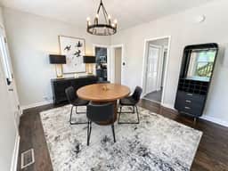 Gothic-meets-mid-century 2BR in Lakeview | Statement Kitchen + Dining for 4