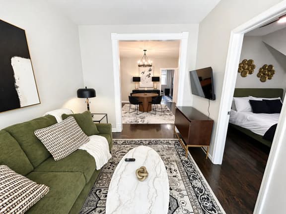 Gothic-meets-mid-century 2BR in Lakeview | Statement Kitchen + Dining for 4